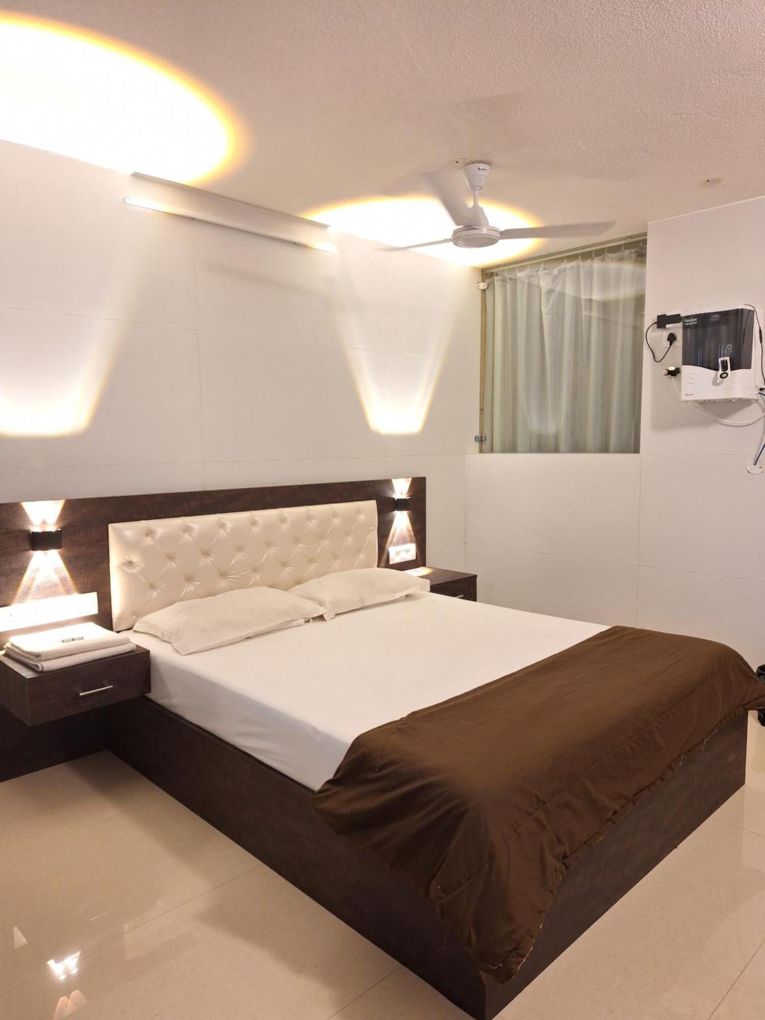 Suvarna Grande Homes Mangalore Rum bild