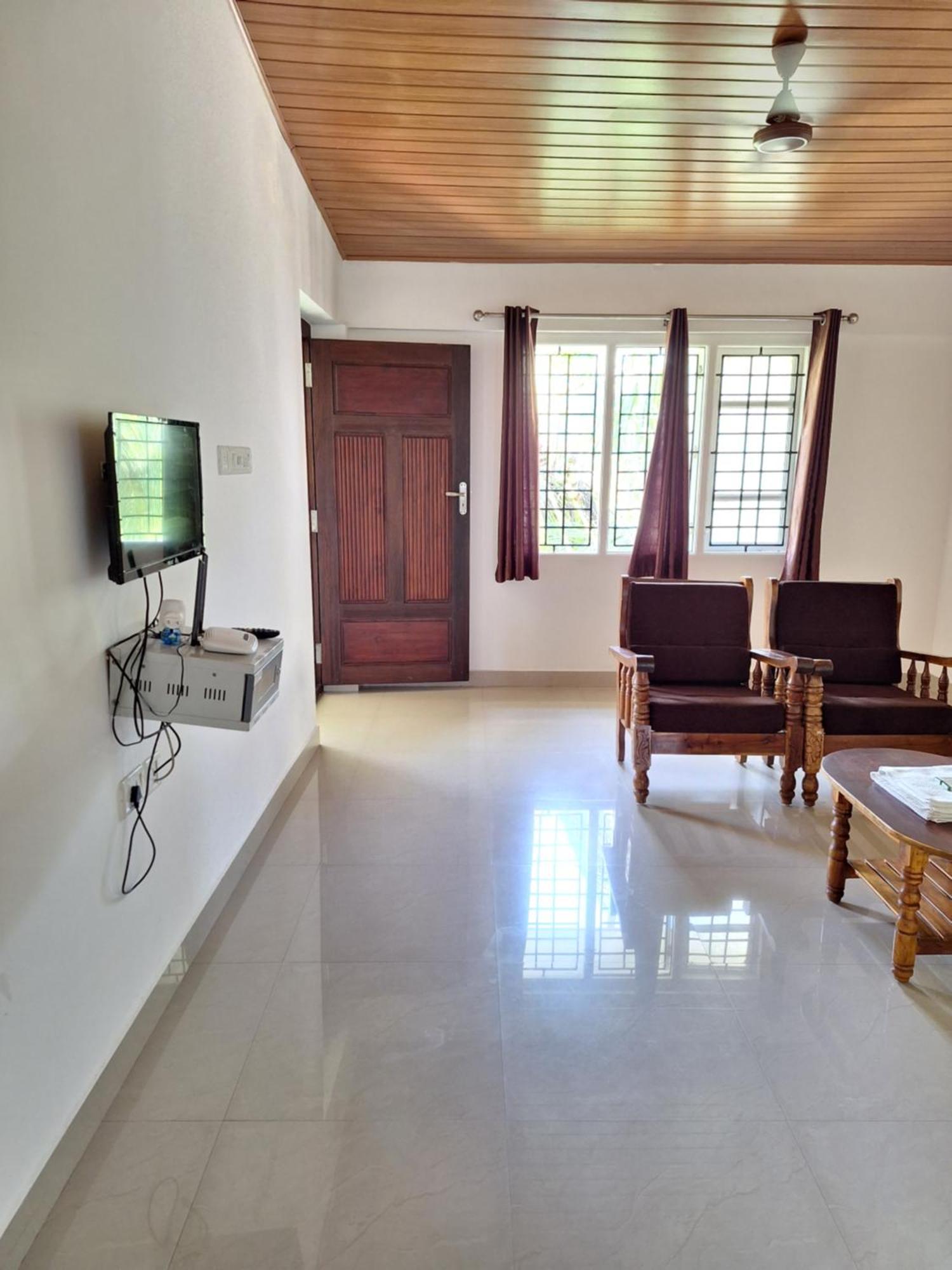 Suvarna Grande Homes Mangalore Rum bild