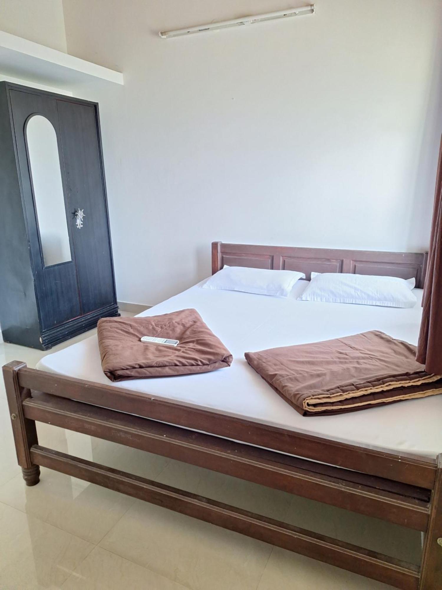 Suvarna Grande Homes Mangalore Rum bild
