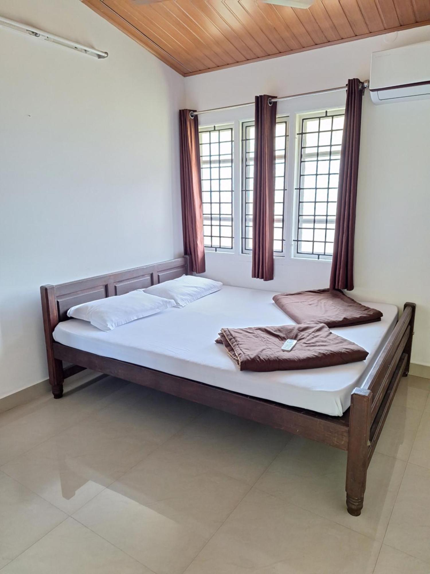 Suvarna Grande Homes Mangalore Rum bild