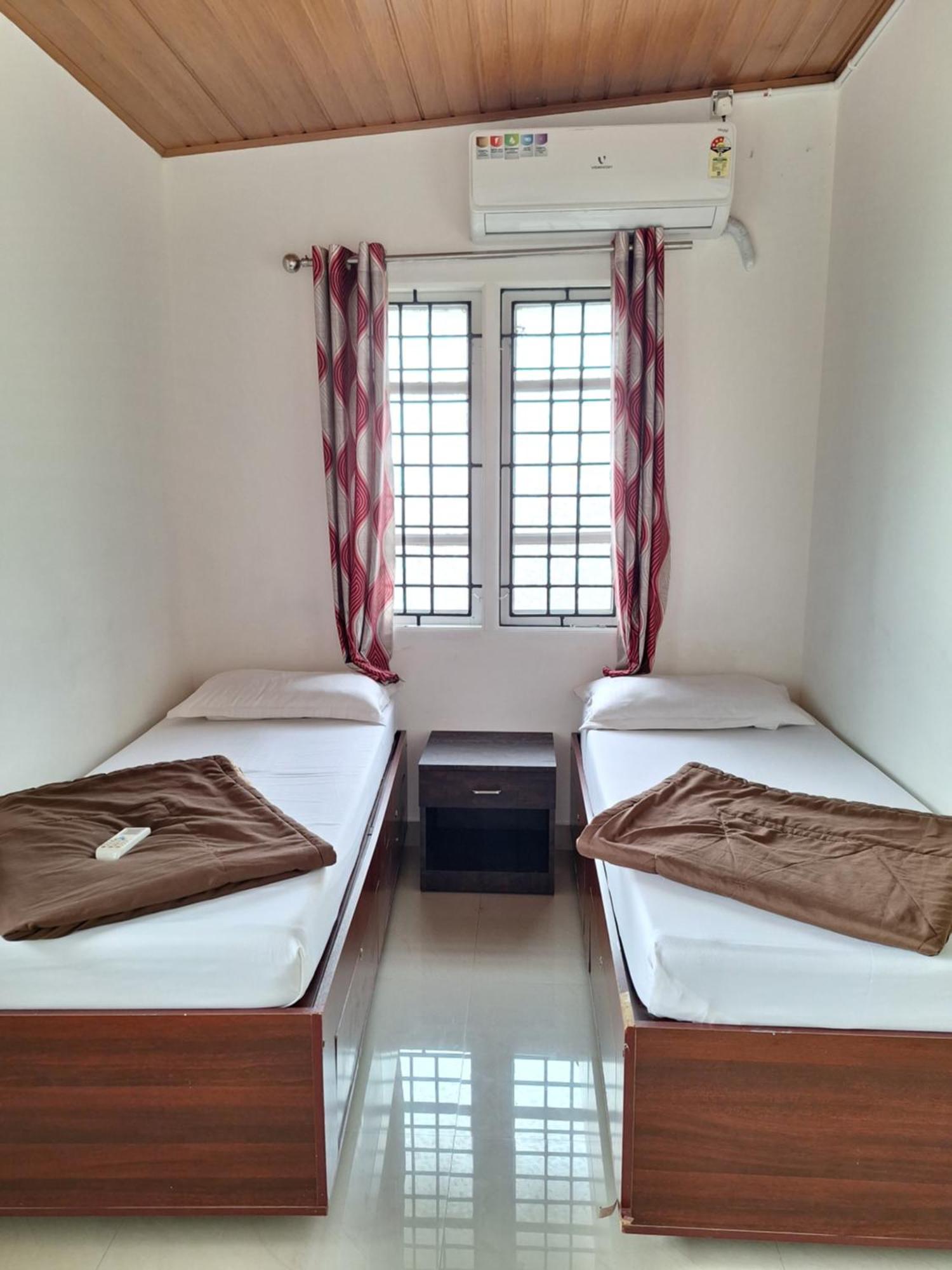 Suvarna Grande Homes Mangalore Rum bild