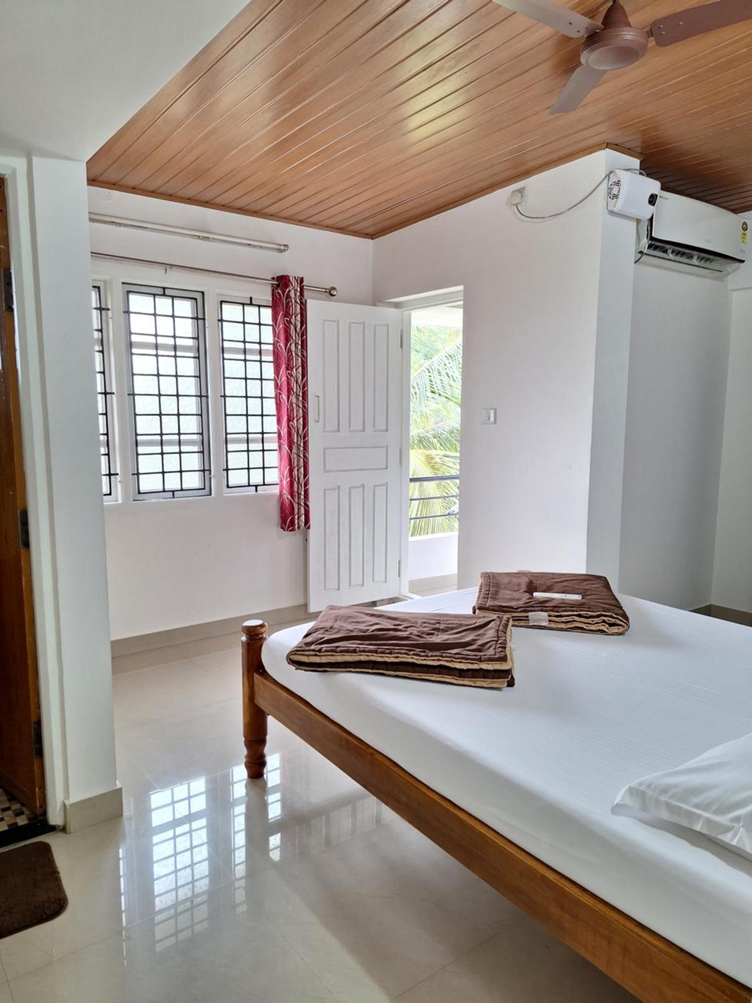 Suvarna Grande Homes Mangalore Rum bild